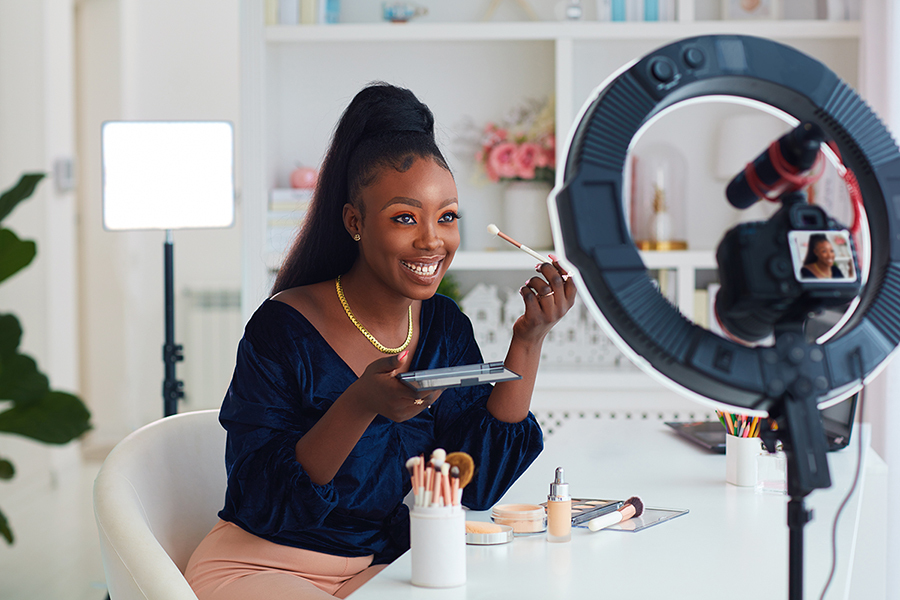An influencer presenting beauty and cosmetics products