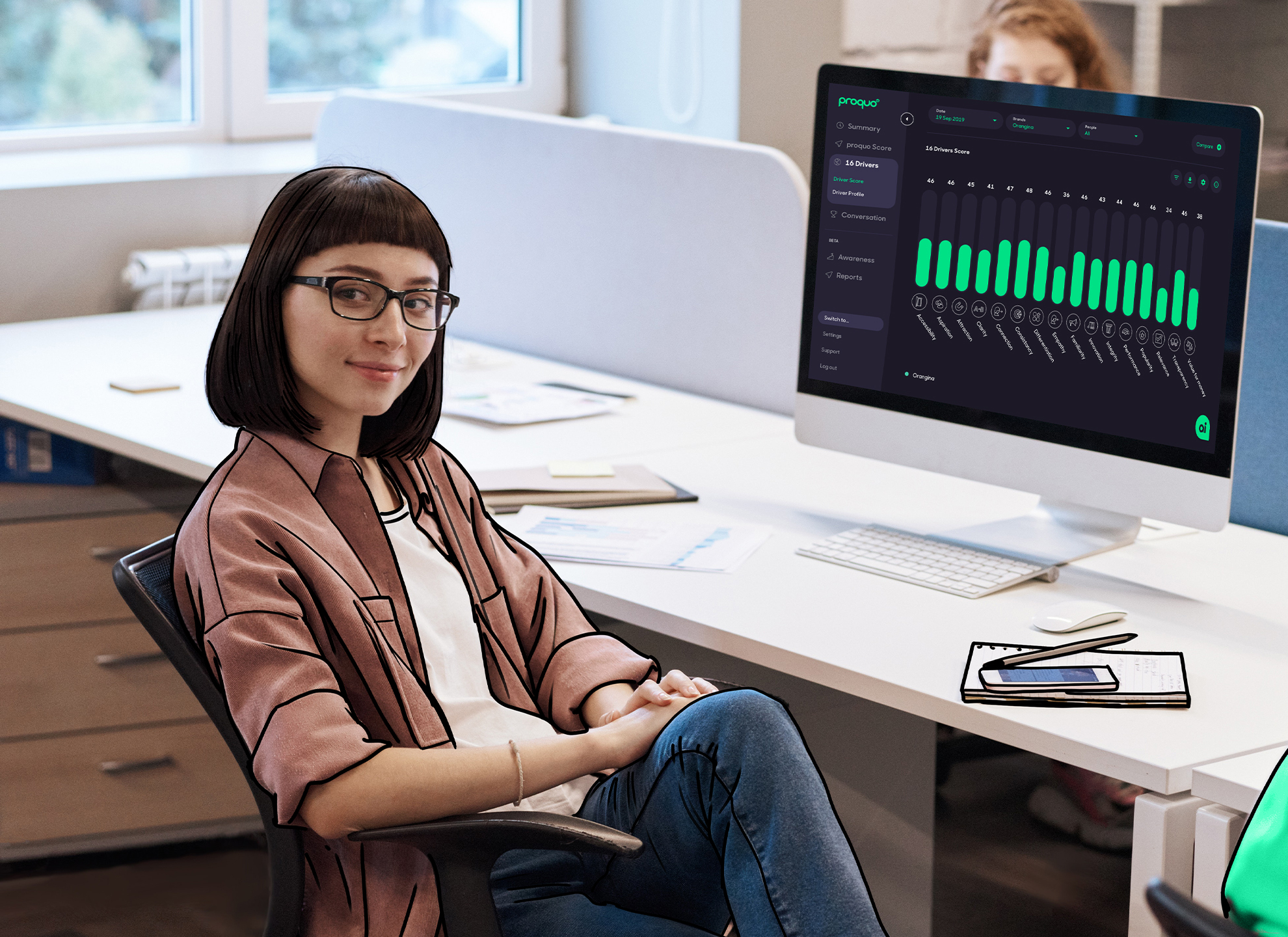 girl sitting at computer tracking brand awareness