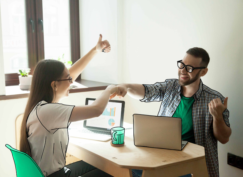 Brand Manager and retail buyer shaking hands in a retailer pitch in an office
