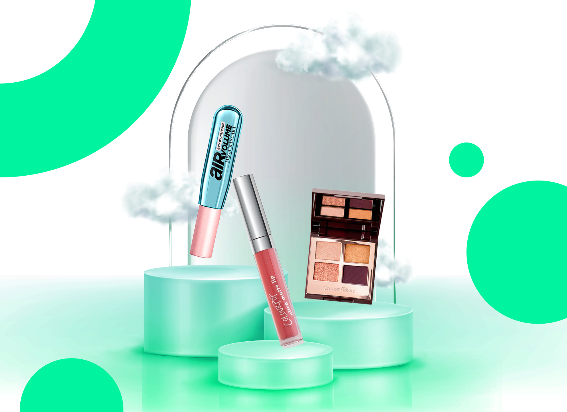 pink lipstick eyeshadow palette and lipgloss on podiums next to a mirror on a green background